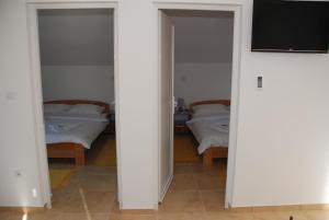 Letto o letti in una camera di Vila Simic Srebrno Jezero
