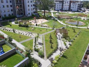 an aerial view of a park with a playground at Apartament LUX in Ełk