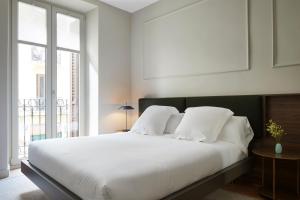 Postel nebo postele na pokoji v ubytování Azoka Suite by FeelFree Rentals