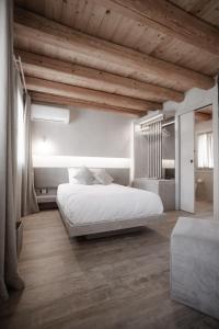 Posteľ alebo postele v izbe v ubytovaní Locanda MaMaGiò