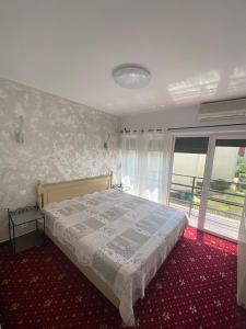 Postel nebo postele na pokoji v ubytování Vila Ammos Mamaia Sea View + 23 fotografií