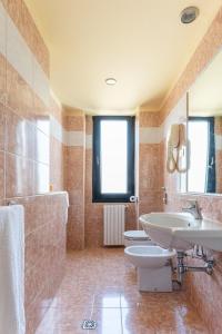 Koupelna v ubytování Hotel Garda