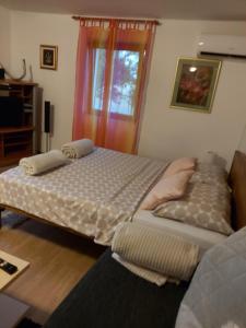 Posteľ alebo postele v izbe v ubytovaní Studio apartman KOTRO