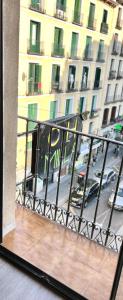 a balcony with a view of a city street at Casa de huéspedes Mi lla in Madrid
