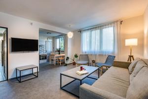 Televízia a/alebo spoločenská miestnosť v ubytovaní bergRESORT apartments