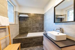 Kúpeľňa v ubytovaní bergRESORT apartments