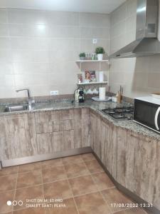 Kuchyňa alebo kuchynka v ubytovaní Apartamento Fez playa de la barrosa