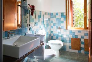 Koupelna v ubytování B&B La Baita