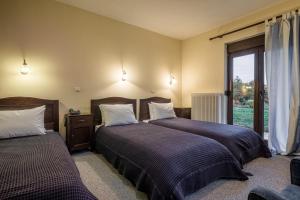 Postel nebo postele na pokoji v ubytování Guesthouse Anastasia + 25 fotografií