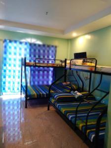 Posezení v ubytování Azulea Lodging House Oslob