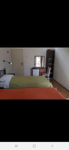 Postel nebo postele na pokoji v ubytování Basil Apartments and Rooms
