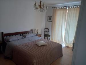 Llit o llits en una habitació de Casa delle Orchidee