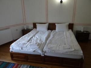 Postel nebo postele na pokoji v ubytování Недкова къща