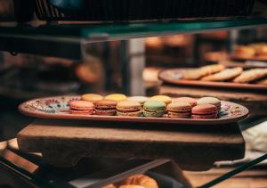 a plate of pastries on a shelf in an oven at Clarion Hotel Mestari in Helsinki