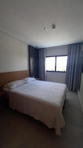 Postel nebo postele na pokoji v ubytování Salinas Premium Resort