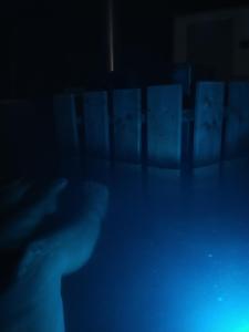 a blurry picture of a hand in the dark at Tiny House Village Resort 