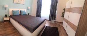 Posteľ alebo postele v izbe v ubytovaní Standard Apartment by Hi5 - Ruin Bar Distr. (059)
