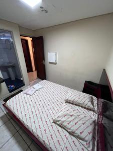 Ένα ή περισσότερα κρεβάτια σε δωμάτιο στο Hotel Fragata