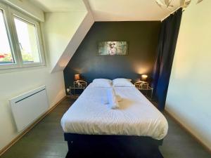 Posteľ alebo postele v izbe v ubytovaní Choupette de la vallée avec garage
