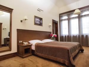 Voodi või voodid majutusasutuse George Hotel toas