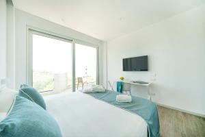 Letto o letti in una camera di Rodi Resort