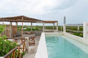 Bazén v ubytování La Casa de Mia Holbox nebo v jeho okolí