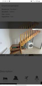 a picture of a wooden staircase in a room at appartement pendine 1 plein sud 53m2 in Puy-Saint-Vincent
