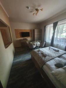 Posteľ alebo postele v izbe v ubytovaní Harmony apartments