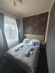 Posteľ alebo postele v izbe v ubytovaní Harmony apartments