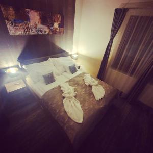 Posteľ alebo postele v izbe v ubytovaní Harmony apartments