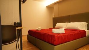 Cama o camas de una habitación en Valmarana Morosini Hotel