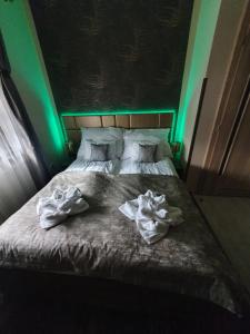Posteľ alebo postele v izbe v ubytovaní Harmony apartments