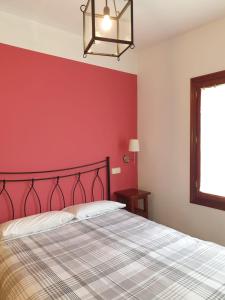 Ένα ή περισσότερα κρεβάτια σε δωμάτιο στο Casa de los sueños