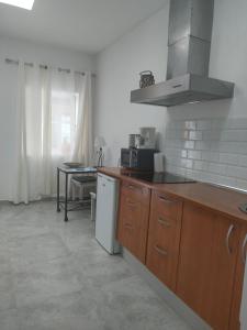 Kuchyňa alebo kuchynka v ubytovaní Casa Alba 1