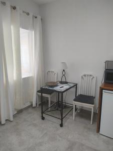 Televízia a/alebo spoločenská miestnosť v ubytovaní Casa Alba 1