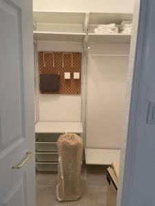 an empty closet with a plastic bag in it at Serene family friendly townhouse in the wonderful Regal Palms in Davenport
