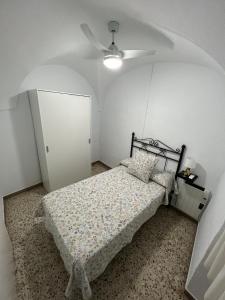 Łóżko lub łóżka w pokoju w obiekcie Casa Villanueva de Córdoba