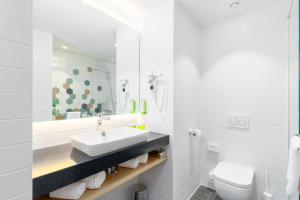 Koupelna v ubytování Clarion Hotel Vienna South