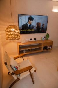 TV a/nebo společenská místnost v ubytování MANGLITO MANILA
