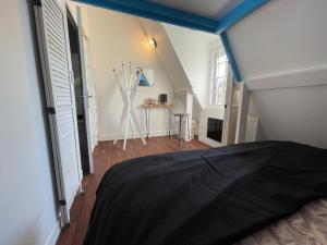 Posteľ alebo postele v izbe v ubytovaní VILLA LA PLAGE