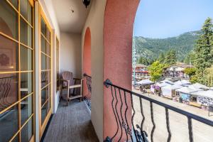 a balcony with a view of a resort at Alpen Dorf Pension in Leavenworth