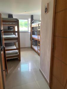 Postel nebo postele na pokoji v ubytování Laguna Hostel