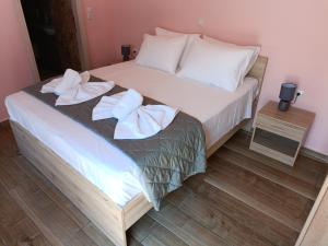Кровать или кровати в номере Lindos Villa Euphoria