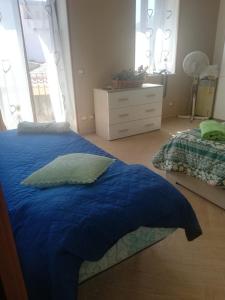 A bed or beds in a room at Casa Domenico