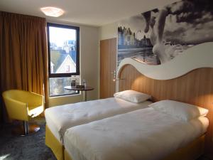 Katil atau katil-katil dalam bilik di ibis Styles Saint Malo Port