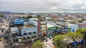 an overhead view of a city with cars and buildings at HOTEL PORTO in Valença