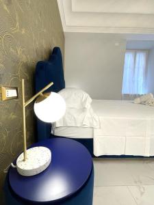 Ένα ή περισσότερα κρεβάτια σε δωμάτιο στο Casa Balzola - Suite Astra
