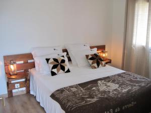 Postel nebo postele na pokoji v ubytování Casas nas Hortas + 37 fotografií