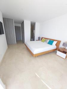 Cama o camas de una habitación en apartasuit exclusivo con vista al mar