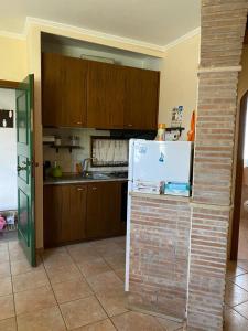 Kuchyň nebo kuchyňský kout v ubytování Casa di Paola mare Ardea